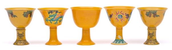 A group of Chinese yellow ground wares: including a dragon bowl enamelled in green with two dragons
