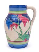 A Clarice Cliff Bizarre Lotus jug: painted in the Rudyard pattern of a continuous landscape,