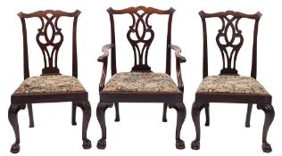 A set of eight 19th Century carved mahogany dining chairs in the Chippendale taste - including an