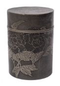 A Chinese pewter cylindrical tea canister: decorated with swallows and peony on a stippled ground,
