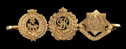 A military brooch,: the brooch with three regimental badges for the York & Lancaster Regiment,