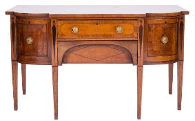 An early 19th Century mahogany crossbanded and inlaid breakfront sideboard:,