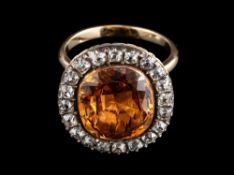 An orange topaz and diamond ring,: converted from a late 18th century brooch,