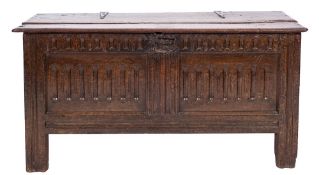 A late 17th Century oak rectangular coffer:, with a plain hinged top,