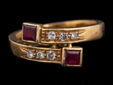 An 18 carat gold, ruby and diamond ring:,
