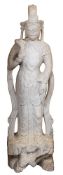 A large Chinese micaceous marble statue of Guanyin: in the Tang style,