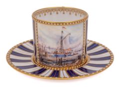 A Lynton Porcelain [Derby] 'jewelled' coffee can and saucer by Stefan Nowacki: painted in Sevres