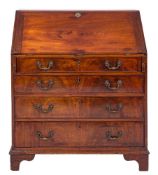 A George III mahogany bureau:,