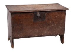 An early 18th Century oak rectangular coffer:, of small size and plank construction,