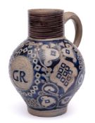 A large German Westerwald grey stoneware jug: of globular form with cylindrical ribbed neck,