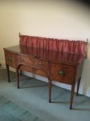 A 19th Century mahogany and inlaid bow fronted sideboard:, crossbanded in satinwood,