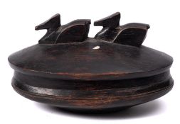 A carved wood oval bowl and cover, probably Polynesian: with finial in the form of two ducks,