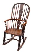 A provincial elm and ash high back Windsor rocking chair, first half 19th century,