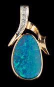 A 14 carat gold boulder opal and diamond pendant,: the oval shaped boulder opal in a collet setting,