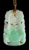 A jadeite pendant,: the carved pendant, on a 14 carat gold chain, stamped 14k,