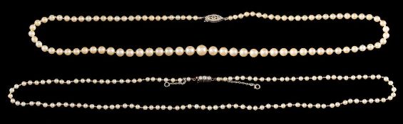 A pearl and diamond necklace,: the single strand necklace with 2.
