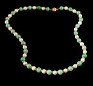 A cultured pearl and jadeite necklace,: the alternating 6.8mm cultured pearls and 7.