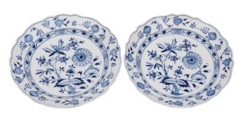A pair of large Meissen blue and white onion pattern dishes: with lobed rims,