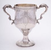 A George III silver twin handled cup, maker Matthew West, Dublin,