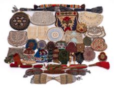 A collection of 19th century and later miser purses,
