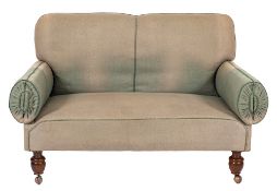 A metamorphic upholstered 'sleeper sofa', early 20th century,: with later green fabric coverings,