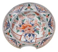 A Japanese Arita porcelain shaving bowl: of traditional scalloped form decorated in underglaze blue