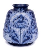 A William Moorcroft for James Macintyre Florian ware vase: of squat baluster form,