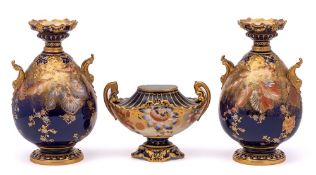 A pair of early Royal Crown Derby two-handled vases and a similar urn: painted in cobalt blue,