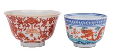 Two Chinese bowls: the first enamelled in iron-red with lotus and bats with Buddhist knots and