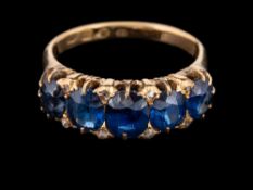 An 18 carat gold sapphire and diamond ring,