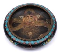 A Chinese cloisonné dish: the centre and sides decorated with dragons chasing fiery pearls to a