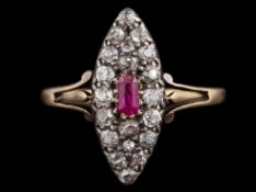 A ruby and diamond ring,: the navette shaped panel set with a central rectangular cut ruby,