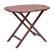 A butler's mahogany oval drop flap tray on an x-frame folding stand:,