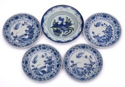 A set of four Japanese Arita blue white dishes and a deep plate: the four painted with pheasants,