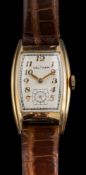 Waltham, a gold filled wristwatch,: the silvered dial with Arabic numerals,
