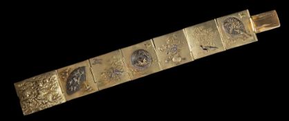 A late 19th century shakudo bracelet,: circa 1890, designed as seven panels,