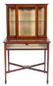 An Edwardian mahogany and inlaid display cabinet:, crossbanded in satinwood,
