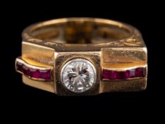 A 1940s diamond and ruby ring,: the brilliant cut diamond estimated to weigh 0.