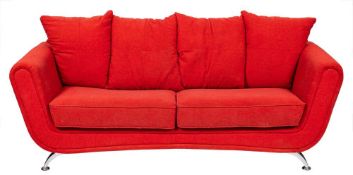 A contemporary red upholstered sofa raised on polished steel legs: