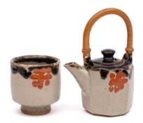 *John Maltby [1936-2021] a stoneware teapot and unomi: the former of cut sided octagonal form and