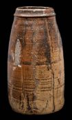 * Bernard Leach [1887-1979] a stoneware vase: of tapering cylindrical form with incised and combed