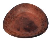 *Siddig El Nigoumi (1931-1996), a pottery dish: of rounded triangular form,