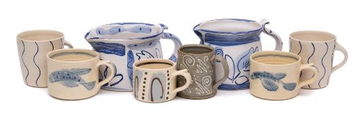 A group of studio pottery: comprising two Val Sparkes jugs with blue brushwork decoration,
