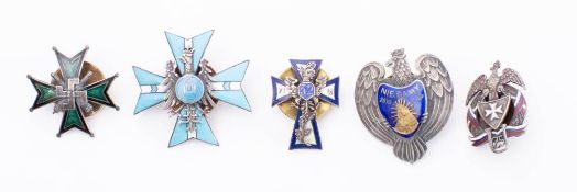 A collection of Polish metal and enamel Regimental association badges: includes Nie Damy Regiment,