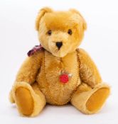 A blonde plush Herman 'Teddy': plastic eyes,