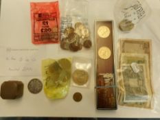 A collection of British and world coins including an 1890 double Florin and four banknotes.