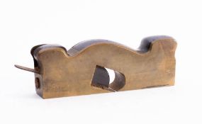 An 8 inch solid brass rebate plane by J Syme, London: stamped as per title, ebony infill.