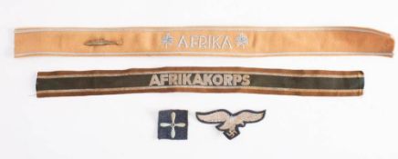 A WWII German Afrika Corps cuff title: with associated silver gilt submarine badge,