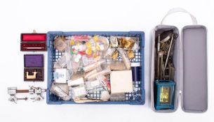 A small collection of various watch and clock parts: including balances etc.