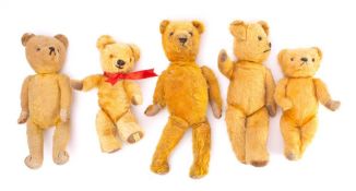A Chad Valley blond plush musical Teddy bear: together with a Merrythought blonde plush bear and